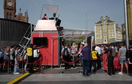 queuing people in front of the modulbox mobile event container used by arsenal football team for its photoshooting booth